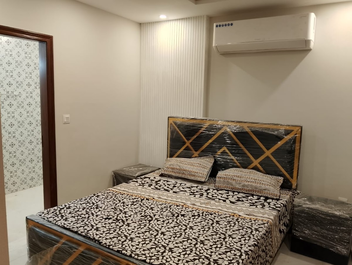 Al-Madina Hotel - coed hostel in Faisalabad, Punjab
