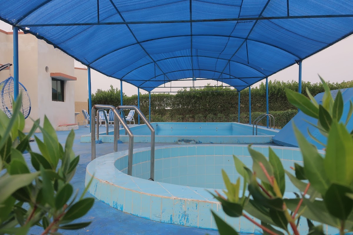 Family & Friends Palm Resort Farmhouse - coed hostel in Karachi, Sindh